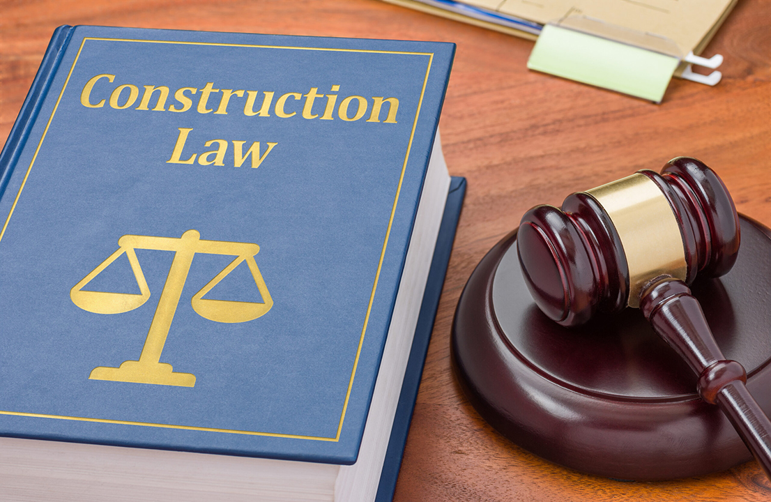A,Law,Book,With,A,Gavel,-,Construction,Law A law book with a gavel - Construction law